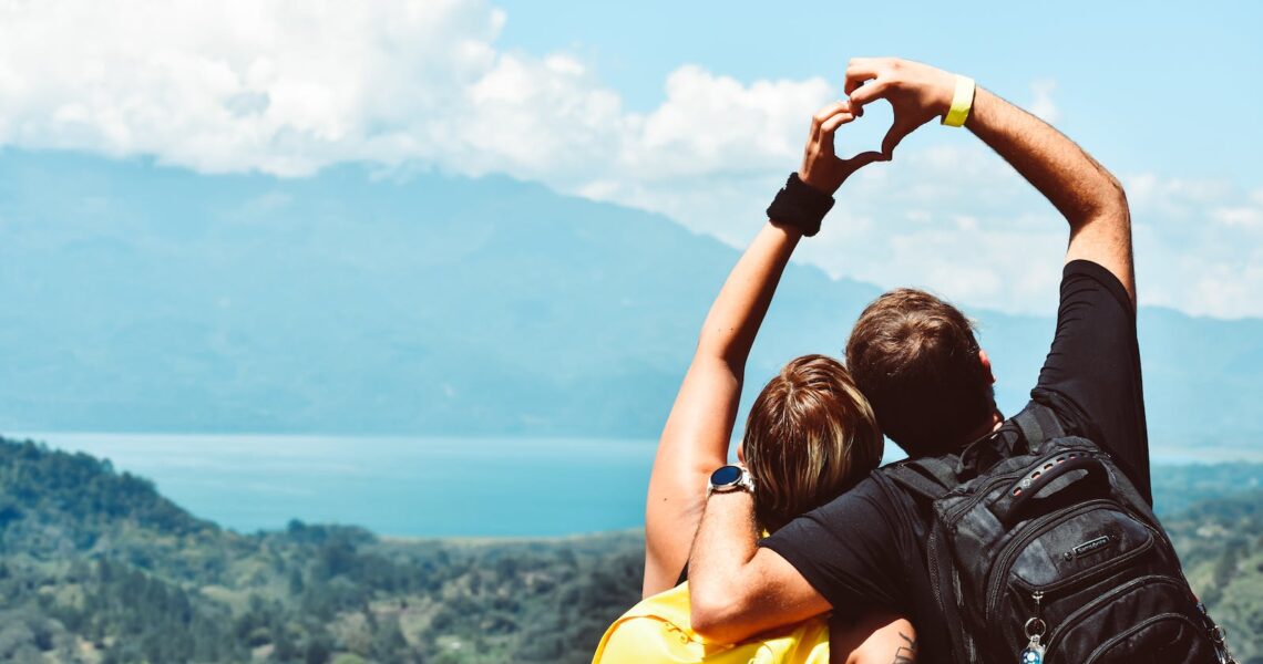 Two People Forming Heart Hand Shape